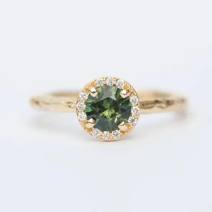 Anueva Jewelry Rings Diamond and Green Sapphire Engagement Ring in Hand Carved Recycled Yellow Gold Earthy Setting Emerald Sapphire Engagement Ring by Anueva Anueva Jewelry Rings Diamond and Green Sapphire Engagement Ring in Hand Carved Recycled Yellow Gold Earthy Setting Emerald Sapphire Engagement Ring by Anueva