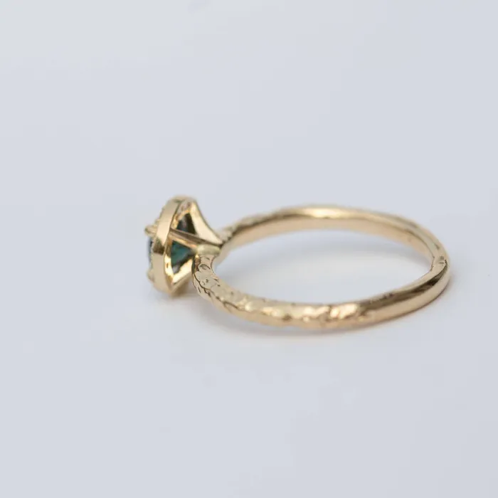 Anueva Jewelry Rings Diamond and Green Sapphire Engagement Ring in Hand Carved Recycled Yellow Gold Earthy Setting Emerald Sapphire Engagement Ring by Anueva Anueva Jewelry Rings Diamond and Green Sapphire Engagement Ring in Hand Carved Recycled Yellow Gold Earthy Setting Emerald Sapphire Engagement Ring by Anueva