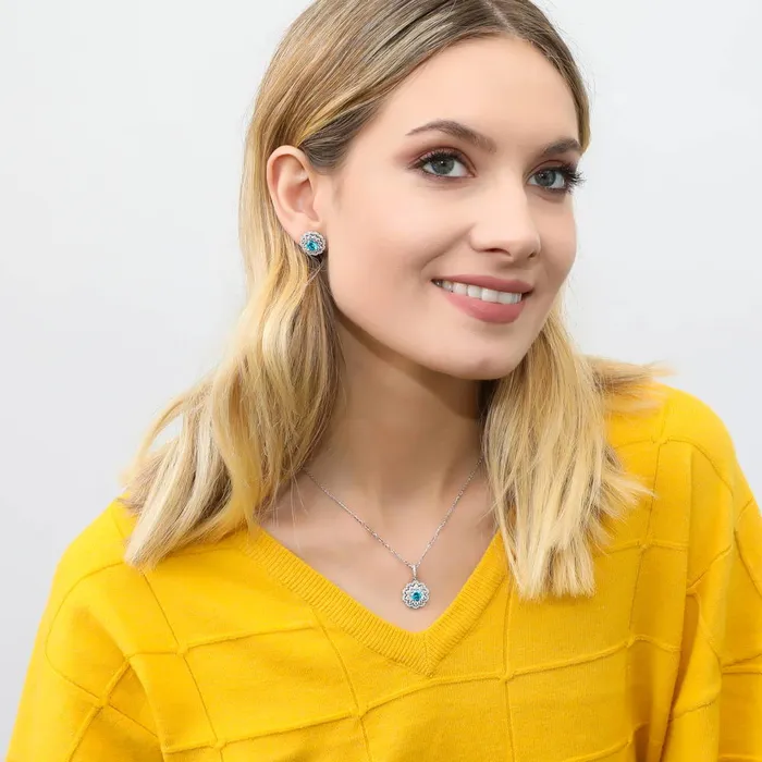 Flower Halo Blue CZ Stud Earrings in Sterling Silver BERRICLE Earrings