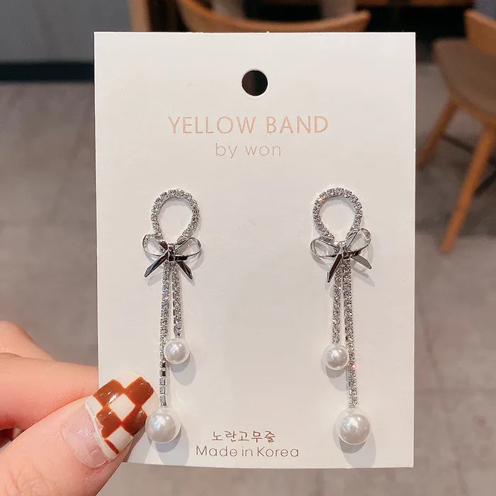 Silver Ribbon with Pearls Dangle Earrings Refined by AnnaKaci Earrings Silver Ribbon with Pearls Dangle Earrings Refined by AnnaKaci Earrings